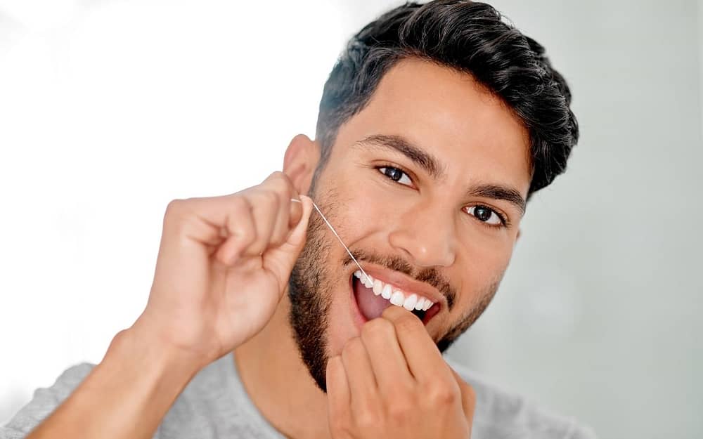 brush-and-floss-regularly-to-avoid-food-traps-Bradford-Dentist