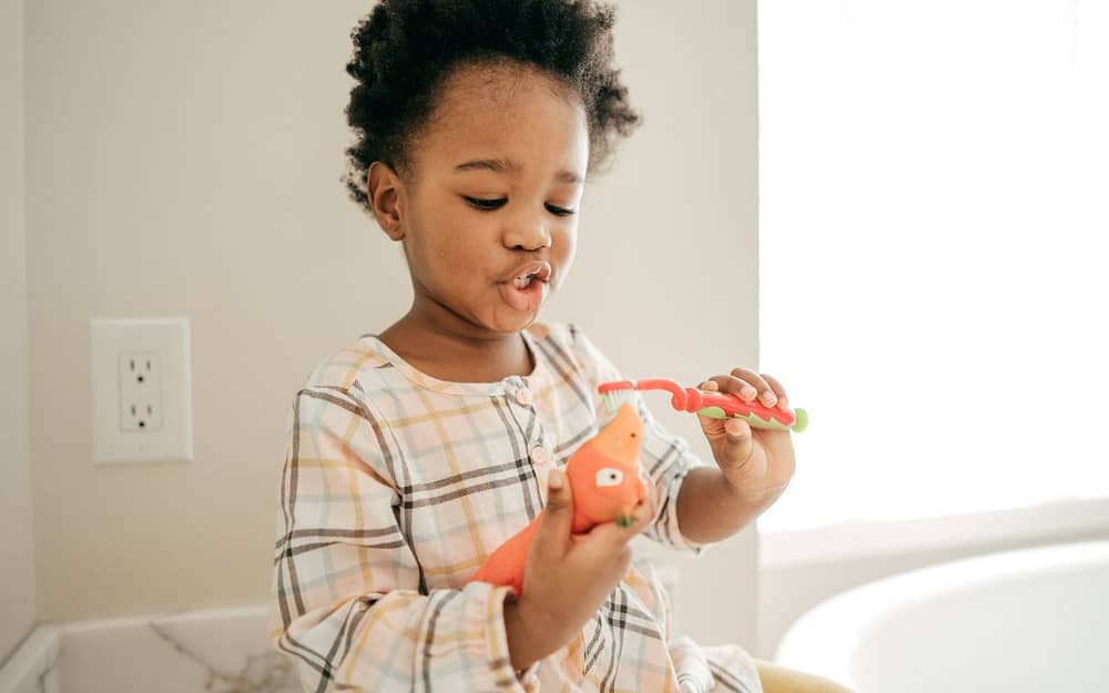 how-to-get-kids-to-brush-their-teeth-let-them-brush-their-toys-teeth