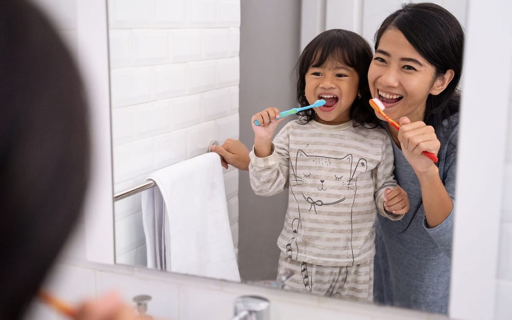 fun-ways-to-get-kids-to-brush-their-teeth-brush-with-them